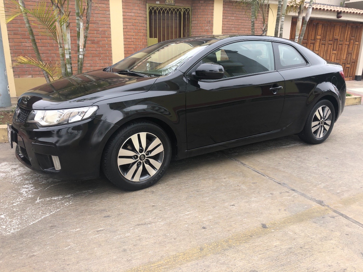 Kia cerato 2012 года